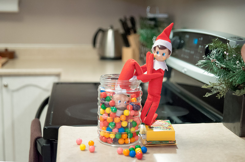 Elf on the Shelf with buddy stealing gumballs > > Newmarket Family Photography by Sugarlens Photography